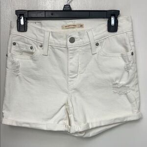 62. Levi distressed Mid Length white Jean shorts,Sz 26, cuffed bottoms, EUC